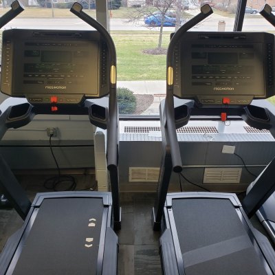 back view of treadmills